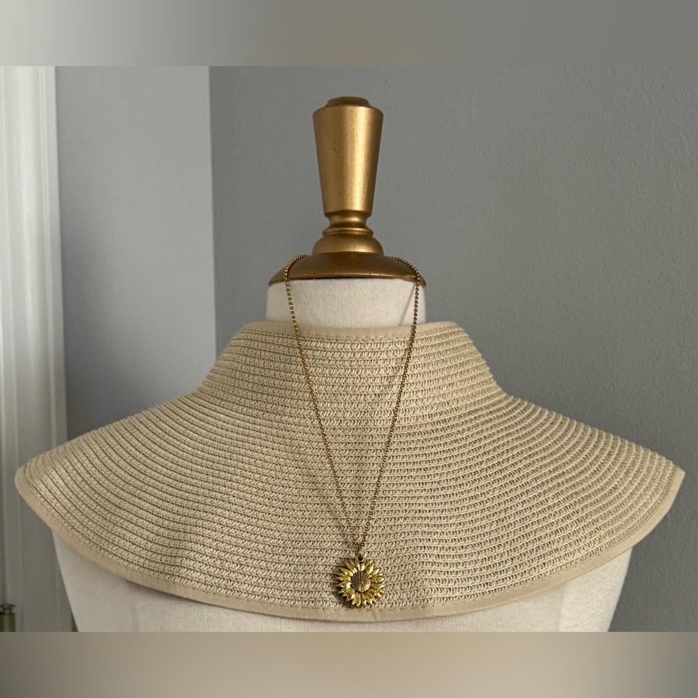 New with tags! Roll-up Straw Hat with velcrow bow!